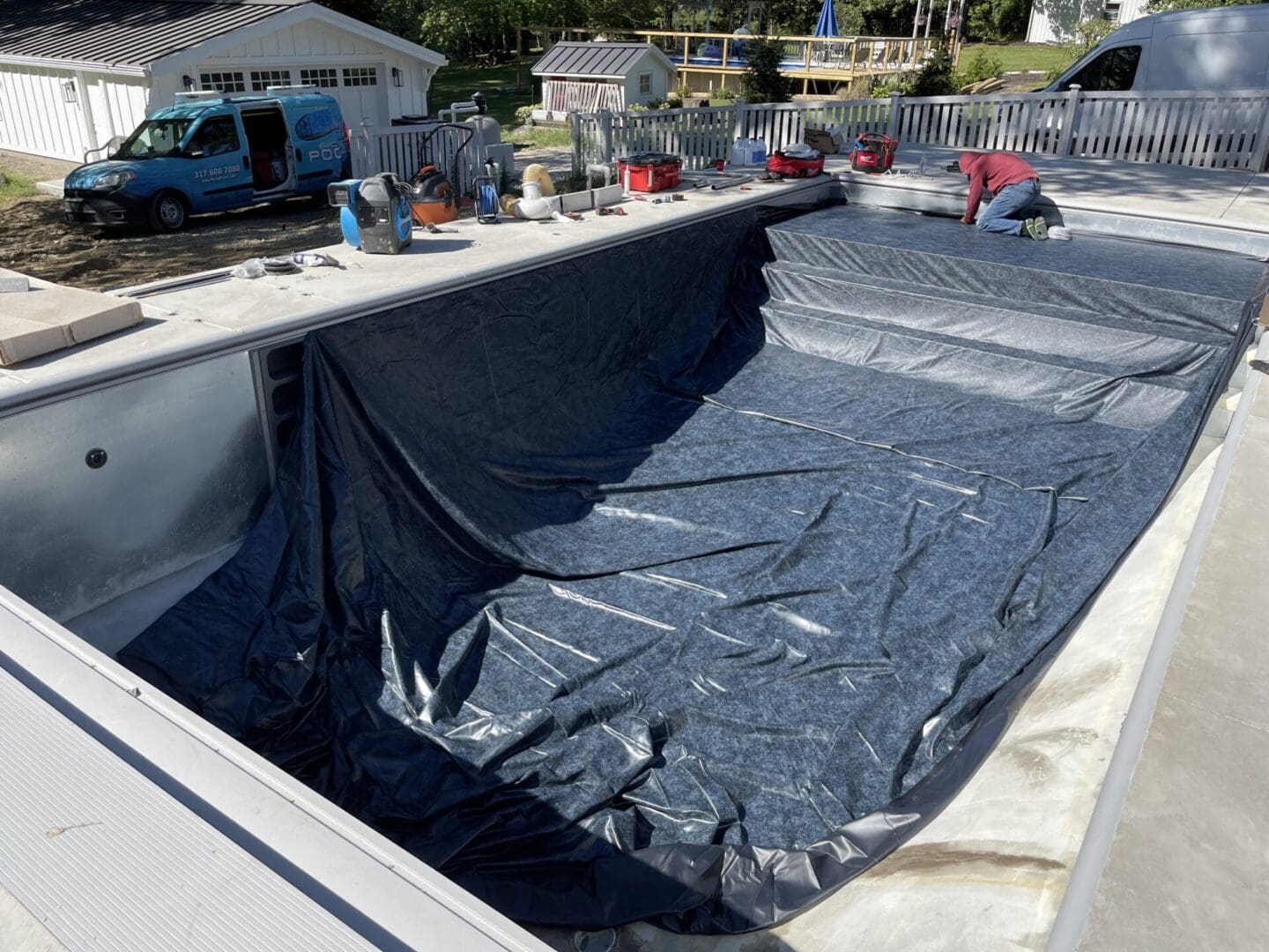 A pool that has been wrapped in tarps.