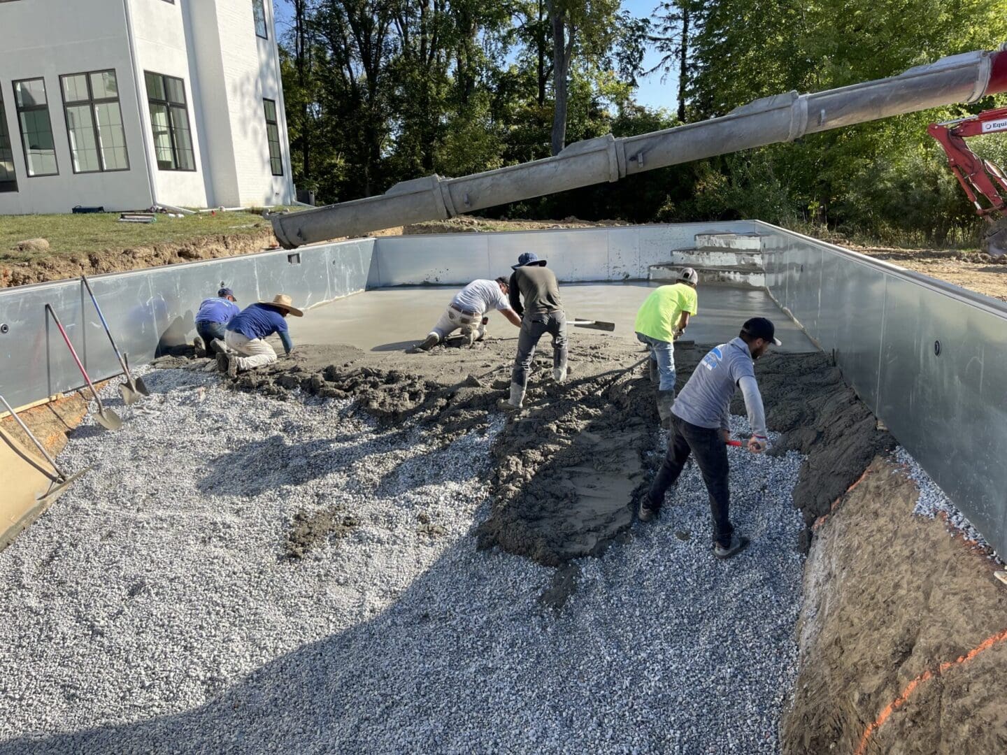 A group of people working on the ground.